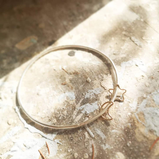 Silver Bangle with star and moon charms